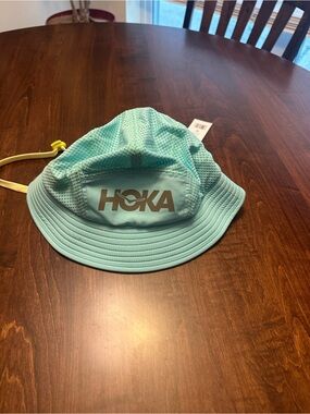Hoka Mint Green Bucket Hat with Yellow Chin Strap